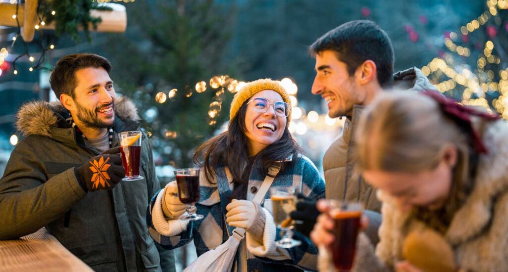 Happy people drinking at resort